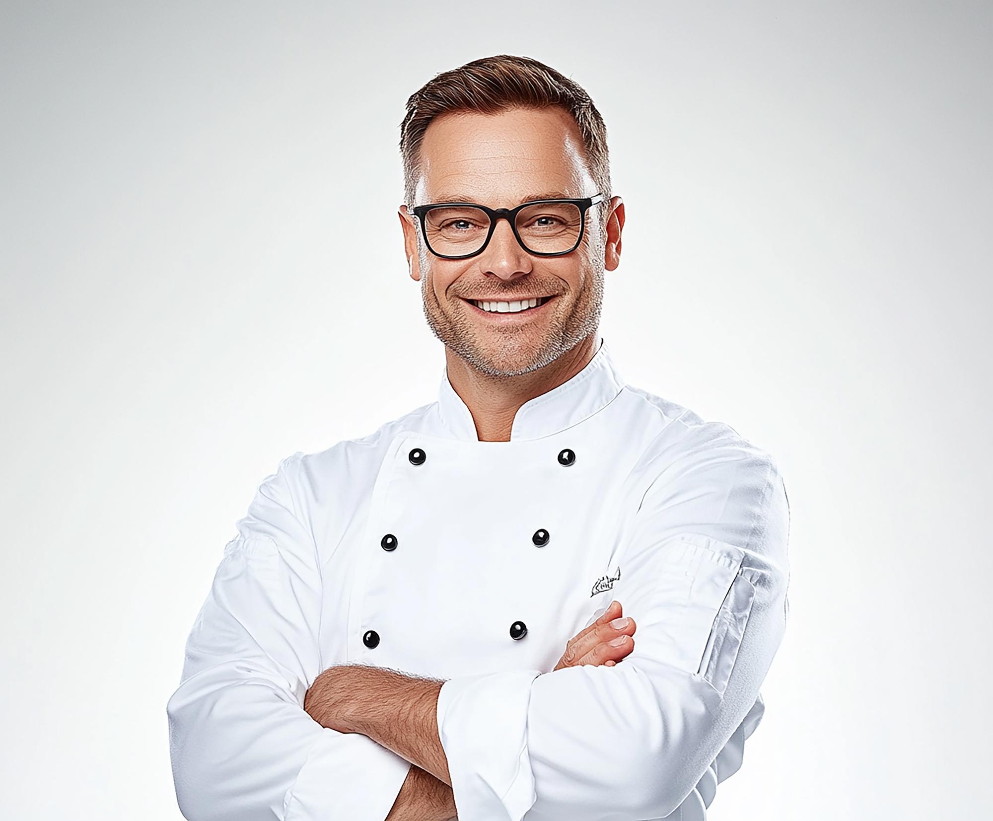 chef in modern studio smiling